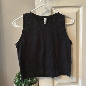 Lululemon muscle/jersey tank - logo in holes on the shirt